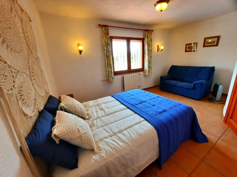 Bedroom with reading sofa