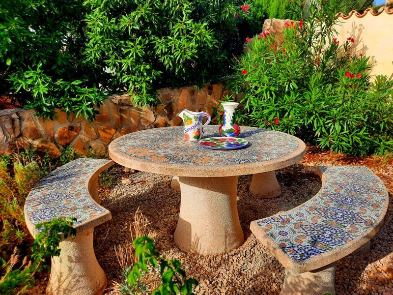 Mosaic stone table in the garden