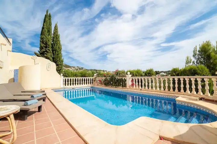 Corner of the pool with the villa behind