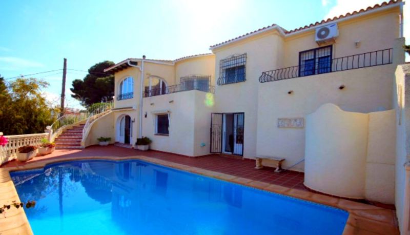 The villa and pool together